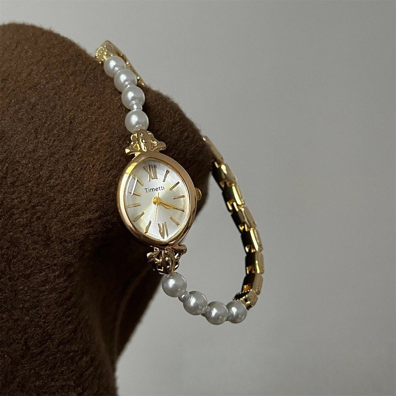Pearl and gold fashion watch